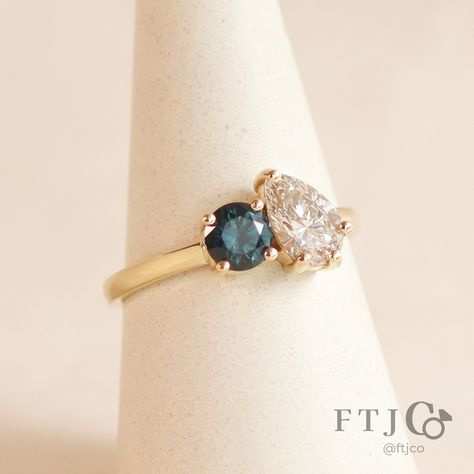 We are absolutely smitten with this luscious Toi et Moi ring 😍 It's such a great combo - the pear diamond has a warm blush-like flush, which pairs so beautifully with the deep teal Montana sapphire... all set in our buttery 18K yellow gold?! What more can we ask for!! This masterpiece was made for a very lucky client, so it isn't available for purchase... but if you're just as gobsmacked as us, please reach out, as we can make a similar ring just for you! 💎🍐💕 . This is a Toi et Moi Ring made ... Cute Engagement Rings, Montana Sapphire, Ring Boho, Pear Diamond, Deep Teal, Boho Rings, The Deep, Montana, Pear