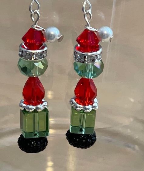 This Dangle & Drop Earrings item is sold by LovleeFinds. Ships from Newnan, GA. Listed on Mar 15, 2024 Trendy Jewelry Ideas, Holiday Jewelry Ideas, Grinch Earrings, Grinchmas Party, Cute Grinch, Crafts 2024, Xmas Jewelry, Grinch Crafts, Christmas Beading