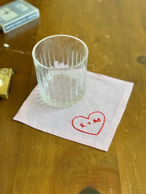 Custom heart and initial hand embroidered linen cocktail napkin. I've been gifting these as engagement  gifts for years! I finally decided to make a listing for them!  100% linen with 100% cotton embroidery thread. Napkins available in black, white, pink, forest green, baby blue and pale yellow!  I highly recommend you spot clean these as the embroidery is very delicate. With that said, you absolutely can wash in cold water on a delicate cycle, tumble dry and iron to bring back to life. Please D Wedding Napkin Embroidery, Hand Embroider Initials, Embroidery Napkins Wedding, Cocktail Napkin Embroidery, Hand Embroidered Cocktail Napkins, Hand Embroidered Wedding Gift, Embroidery Napkins Table Linens, Embroidered Napkins Diy, Embroidered Napkins Wedding