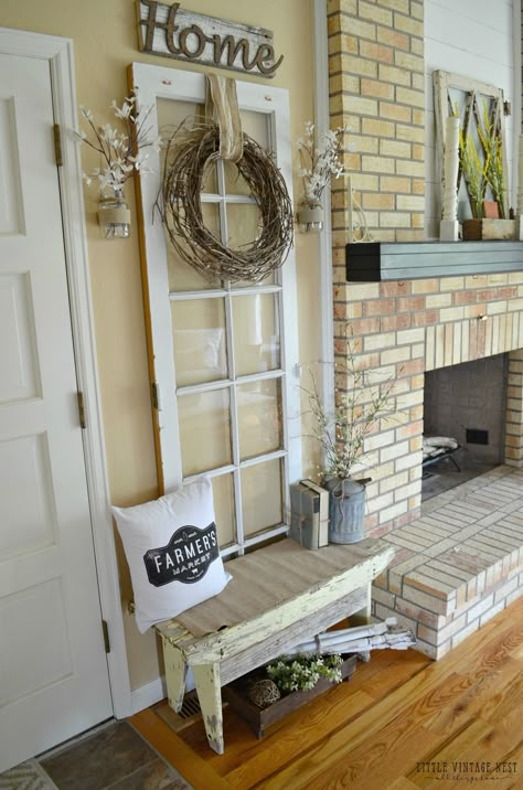 Old Door in Entryway                                                                                                                                                     More French Door Wall Decor, Antique Door Wall Decor, French Door Decor Ideas, French Door Decor, Shabby Chic Entryway, Farmhouse Front Porch Decorating, Rustic Farmhouse Entryway, Vintage Entryway, Foyer Wall