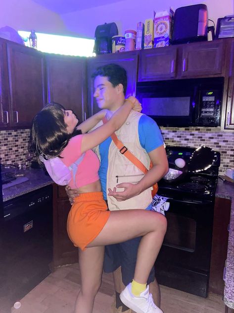 Dora And Boots Couple Costume, Rare Couple Halloween Costumes, Couples Halloween Costume For Brunettes, Unique Couple Halloween Costumes Brunette, Brown Couple Costumes, Lili And Stitch Costume Couple, Couple Themed Halloween Costumes, Couples Halloween Costumes Brunette, Cute Couple Halloween Outfits