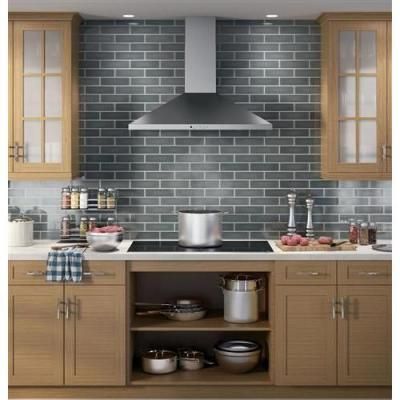 GE 36 in. Convertible Chimney Range Hood in Stainless Steel - JVW5361SJSS - The Home Depot $494 Gray Tile Backsplash, Chimney Range Hood, Replacing Kitchen Countertops, Stainless Range Hood, Decoration Vitrine, Kitchen Hood, Wall Mount Range Hood, Kitchen Hoods, Kitchen Range