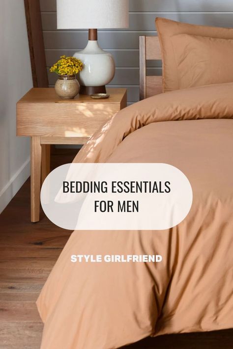 close-up of a bed and bedside table with a lamp and small vase of flowers. text on-screen reads: bedding essentials for men (style girlfriend) Bedding For Men, Men Living Room, Men's Bedding, Men's Bedroom, Essentials For Men, Home Decor Men, Masculine Interior, Style Girlfriend, Bedroom Hacks