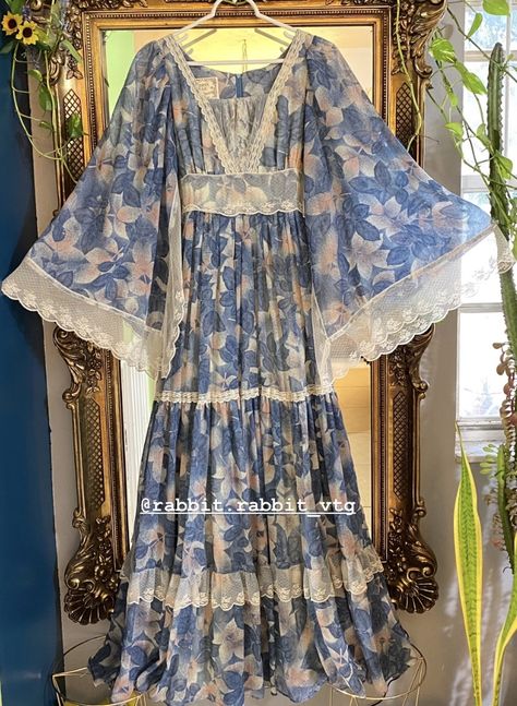 Blue and pink floral print Gunne Sax Angel Sleeve Maxi hanging on gold framed mirror Gunne Sax Dress 80s, Farewell Dresses, Vintage Gunne Sax Dress, Sax Dress, Cottagecore Outfits, Gunne Sax Dress, Muslim Fashion Hijab Outfits, Simple Pakistani Dresses, Angel Sleeve