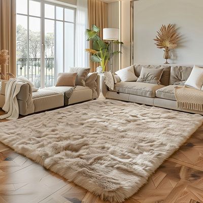 Our faux fur rug is made from an artificial wool length of 2.5 inches, touching very thick and warm. Our brand is not only to provide customers with high-quality fabrics but also to bring customers a feeling of luxury and comfort. | Mercer41 Jefferey Solid Machine Woven Polyester Area Rug in Light Brown White 71.0 x 47.0 x 2.43 in | C100073825_1591910363 | Wayfair Canada Fur Rug Living Room Decor, Rug For Wooden Floor, Layering Fur Rugs, Neutral Colors Living Room Decor, Cream Shag Rug Living Room, Rugs That Go With White Couches, White Rugs Living Room, Fluffy Living Room Rug, Plush Area Rugs In Living Room