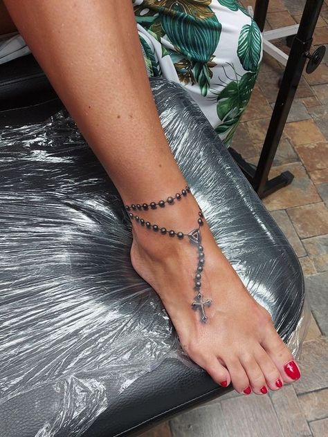 Rosary Anklet Tattoo, Feet Tattoo Ideas, Foot Tattoos For Women Classy, Tattoo Ideas Foot, Rosary Ankle Tattoos, Foot Tattoo Designs, Anklet Tattoos For Women, Ankle Foot Tattoo, Cute Foot Tattoos