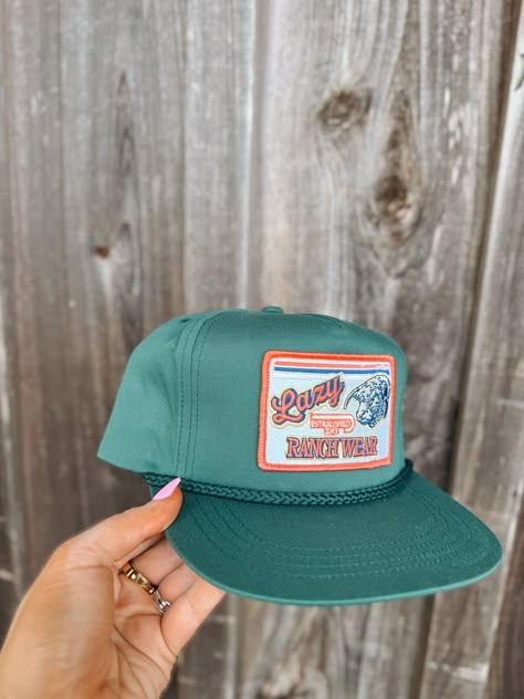 Lazy J Ranch Wear Retro Rope Patch Cap. Green front, green mesh back. 4 inch crown. Rope. Adjustable. Green Vintage Trucker Hat For Outdoor, Green Spring Baseball Cap With Flat Bill, Green Flat Bill Baseball Cap For Spring, Retro Green Visor Baseball Cap, Spring Green Flat Bill Baseball Cap, Trendy Green Baseball Cap For Outdoor, Vintage Green Snapback Hat For Outdoor, Retro Green Baseball Cap For Outdoor, Green Trucker Hat For Spring Outdoor