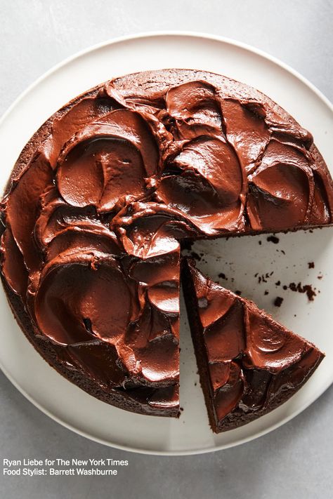 A round chocolate cake with one piece sliced. Photo by Ryan Liebe for The New York Times. Food Stylist: Barrett Washburne. Best Chocolate Cake Recipe, Chocolate Cheese, Yotam Ottolenghi, Best Chocolate Cake, Nyt Cooking, Baking Project, Worlds Best, Chocolate Cake Recipe, Best Chocolate