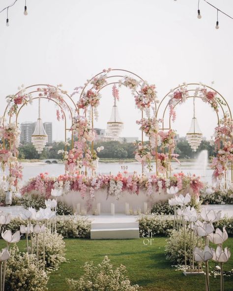 An arch is a decorative accent that has a curved shape which is usually decorated using flowers, leaves, fabric, and others Traditional Wedding Backdrop, Bridal Table Backdrop, Couple Seating, Wedding Theme Design, Outdoor Wedding Backdrops, 2025 Design, Bridal Table Decorations, Wedding Church Decor, Wedding Stage Backdrop