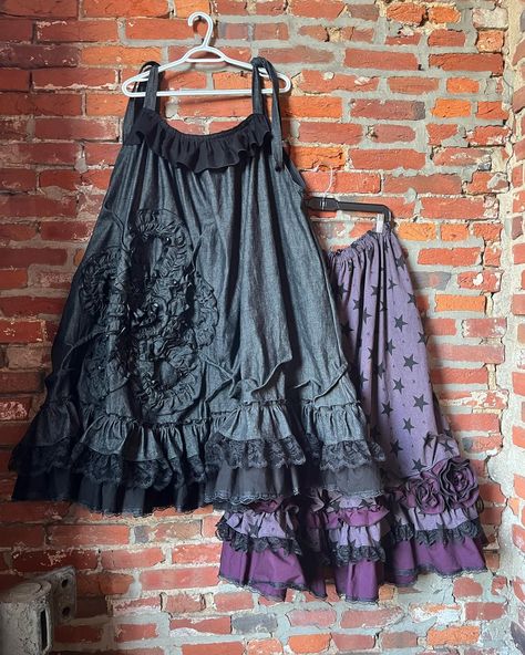 Dropping soon! Working on finishing the bloomers in each size, I was able to find enough fabric! Will update with a time, hopefully tomorrow or Monday! Also, two new dresses I have been working on for awhile! 💜💚🖤. . . . #slowfashion #handmadeclothing #whimsical #whimsigoth #altfashion #cottagecore #fallcore #fairygrunge #artsyclothing #homemade #bloomers #sewinglove #madewithlove #sustainablefashion Cottagecore Gathered Flowy Skirt, Whimsigothic Clothes Skirts, Spring Fairycore Ruffled Skirt, Whimsigoth Cottagecore, Whimsigoth Mini Skirt, Maxi Skirt Fairy Grunge, Keep Working, Artsy Outfit, New Dresses