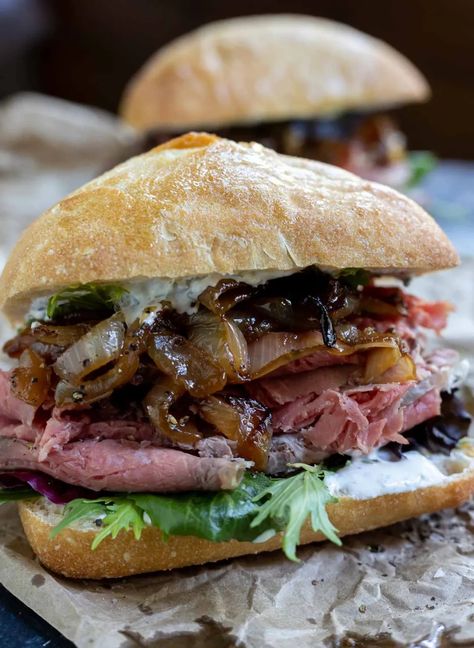 So you made a prime rib roast and are lucky enough to have leftovers, make this Leftover Prime Rib Sandwich Recipe. Thinly sliced prime rib, horseradish mayo, caramelized onions and fresh greens make this the ultimate sandwich experience. Great for lunch or dinner. #primeribrecipes #sandwichrecipes #primerib #lunchrecipes #dinnerrecipes Prime Rib Recipes, Gourmet Sandwiches Recipes, Boneless Prime Rib Roast, Leftover Prime Rib Recipes, Horseradish Mayo, Prime Rib Sandwich, Leftover Prime Rib, Ultimate Sandwich, Rib Sandwich