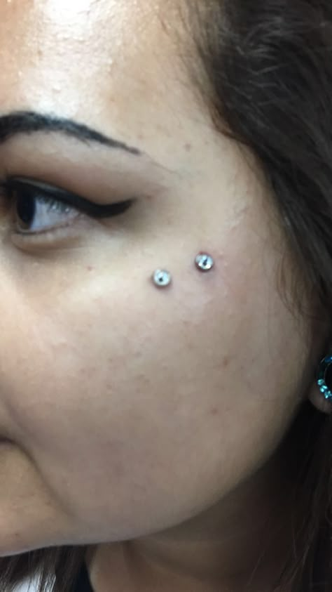 Double eye dermals Double Dermal Piercing, Double Dermal Piercing Face, Dermal Under Eye Piercing, Dermal Cheek Piercing, Cheek Dermal Piercing, Cheek Dermal Piercing Upper, Third Eye Dermal, Eye Dermal, Teardrop Dermal Piercing