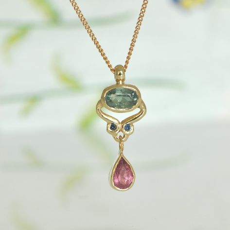 "14k solid gold necklace. Oval green Tourmaline, blue Sapphire and pink Tourmaline Teardrop, 3 colors stones dangle pendant. This unique gold necklace is handmade by me. The pendant is small and delicate and yet, visible and tend attention. It is an everyday gold necklace that you can wear with every style. It a perfect as a love birthday gift. ** 14k Solid Gold ** Pink Tourmaline ** 2 Small Blue Sapphires 1.3 m\"m ** Oval light Green Tourmaline 6*4 m\"m This pendant can be a beautiful set with Oval Stone Necklace, Gem Stone Pendant, Fine Gold Necklace, Solid Gold Necklace, Tourmaline Pendant, Stacked Jewelry, Girly Jewelry, Gems Jewelry, Gift For Wife