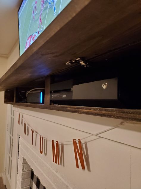 Hide Sound Bar On Mantle, Hide Tv Box On Mantel, Fireplace Mantle With Tv Above, Hollow Mantle Cover, Hiding Cords On Mantle, Hiding Cable Box Ideas Fireplace, Fireplace Mantle Hide Electronics, How To Hide Xbox On Mantle, Hiding Sound Bar On Mantel