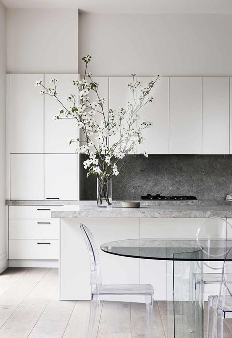 A joint effort between the stylist owner and architect of this Melbourne home has produced a spectacular meeting of styles 120 years apart. French Oak Flooring, Acrylic Chair, Gray And White Kitchen, Road House, Stone Backsplash, Melbourne House, White Kitchen Design, Grey Kitchen, Minimalist Kitchen