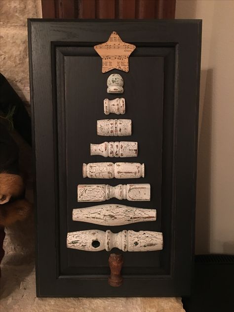 Christmas tree made with old spindles and a cabinet door Christmas Trees Made From Old Doors, Christmas Trees Made Out Of Old Doors, Christmas Tree Made From Old Door, Christmas Tree From Old Door, Vintage Door Knob Christmas Tree, Special Letters, Christmas 2017, Old Doors, Cabinet Door