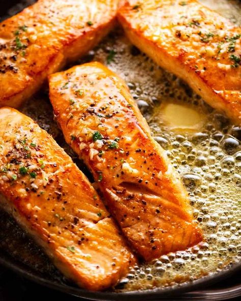 Garlic Butter Salmon in a skillet surrounded by foaming garlic butter Salmon In A Skillet, Garlic Salmon Recipes, Quick Salmon Recipes, Salmon Skillet, Quick Salmon, Sauce For Salmon, Garlic Butter Salmon, Garlic Salmon, Butter Salmon