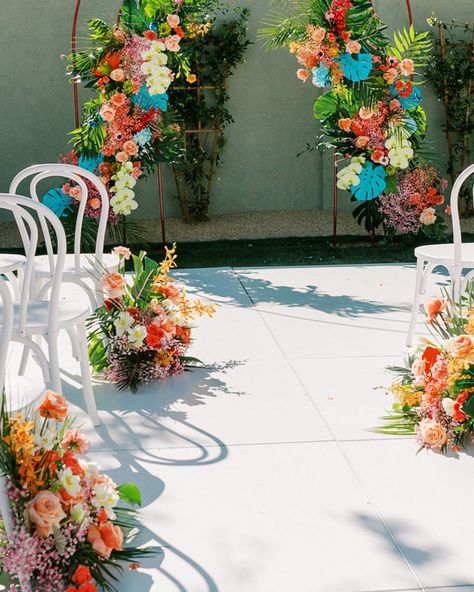 Shalayne and Andrea's Phoenix home served as the perfect backdrop for their bold and vibrant wedding. The backyard was transformed into an intimate paradise, complete with vivid tropical florals and mid-century modern details. Shout out to all of the pros who helped bring this colorful day to life! Planning + Design: @bloomandblueprint Photographer: @sarabeebishop Cinema: @amour_is_french Rentals: @letsbashevents @brighteventrentals Linen: @nuagedesignsinc Signage: @pageandparcel Florist: @b... Tropical Florals, Vibrant Wedding, Life Planning, Phoenix Homes, Plan Design, Shout Out, Real Weddings, Florist, Century Modern