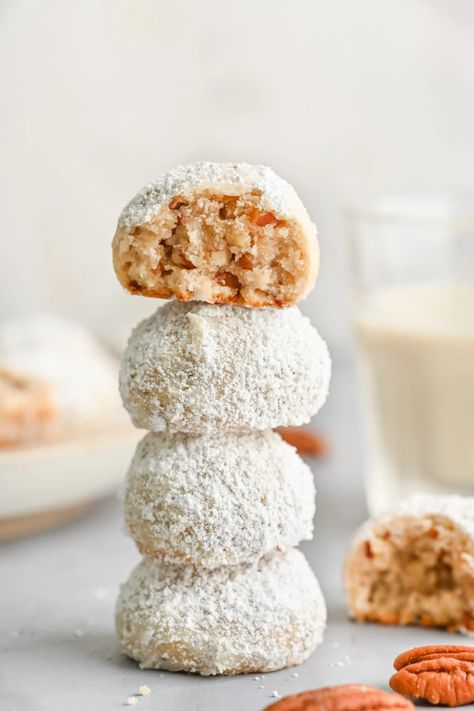 Get into the festive spirit with these delightful Christmas Snowball Cookies. These buttery Pecan Snowball Cookies are a treat for the senses, featuring the perfect combination of pecans and a soft, melt-in-your-mouth texture. These Pecan Ball Cookies are a nutty delight that will have you craving more with every bite. Perfect for holiday gatherings or any occasion, these cookies are a must-try for all cookie lovers. | Pecan Snowball Cookies | Pecan Snowball Cookies Christmas | Buttery Pecan Sno Snowball Cookies Pecan, Pecan Ball Cookies, Snowball Cookie, Pecan Balls, Christmas Snowball, Ball Cookies, Feel Good Foodie, Pecan Snowballs, Pecan Snowball Cookies