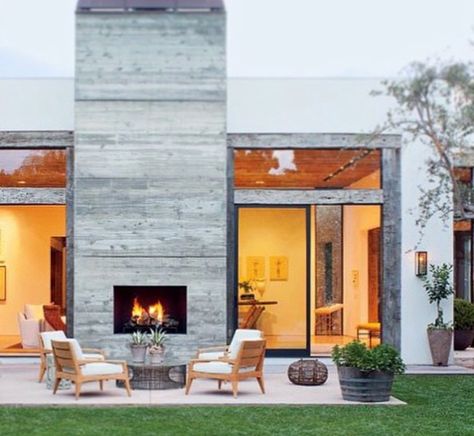 Concrete Fireplace Design Camino, Indoor Outdoor Fireplaces, Outdoor Space Design, Concrete Fireplace, Los Angeles Homes, Celebrity Houses, Fireplace Design, Indoor Outdoor Living, Outdoor Fire