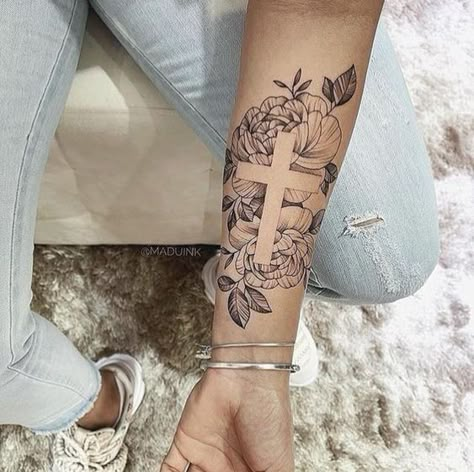 17 Stunning Biblical Tattoo Ideas for Women: Embrace Faith with Graceful Designs Negative Space Cross Tattoo, Unique Upper Arm Tattoos For Women, Christian Tattoos For Women Sleeve, God Tattoos For Women Half Sleeves, Biblical Tattoos For Women Sleeve, Tattoo Arm Sleeve, Unique Half Sleeve Tattoos, Biblical Tattoos, Bible Tattoos