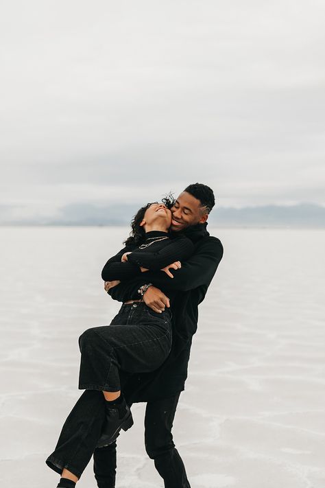 Bonneville Salt Flats Sunrise Couples Session — Annie Zav | Portland Wedding Photographer All Black Couples Photoshoot Outfits, Salt Flats Utah Photoshoot Winter, Salt Flats Photoshoot Couple, Salt Flat Photoshoot, All Black Outfit Couple Photoshoot, Salt Flats Utah Photoshoot Couple, Salt Flats Engagement Photos, Black Outfit Couple Photoshoot, Salt Flats Utah Photoshoot