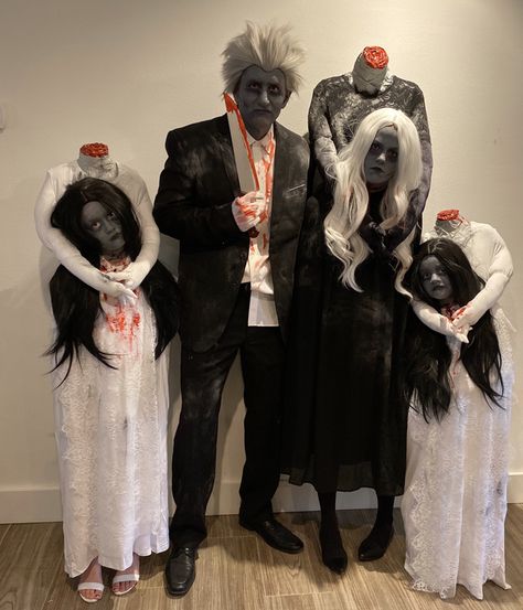 This horrifying headless clan: 17 Family Costumes That Pretty Much Won Halloween Halloween Scary Family Costumes, Scary Costumes For Women Horror, Saw Family Costume, Scary Halloween Costume Ideas Family, Classic Scary Halloween Costumes, Family Halloween Costumes Horror, Scary Family Costumes For 3, Headless Woman Costume, Zombie Family Halloween Costumes