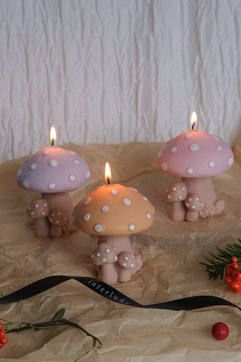 Step into the enchanting realm of our Mushroom Shaped Candle, a unique and hand-painted wonder that comes in a variety of delightful colors. This whimsical candle effortlessly invokes cottagecore and fairy vibes, adding a touch of mystical charm to any space. With its captivating design, it's more than just a candle; it's a piece of art that brings a touch of the magical forest to your home every time you light it. Explore the enchantment and add a touch of wonder to your space with this extraordinary candle. Candle dimensions: 9 x 10 cm Forest Fairy Decor, Mushroom Candles, Mushroom Things, Vintage Mushroom Decor, Cottagecore Decorations, Mushroom Stuff, Mushroom Candle, Fairy Candles, Cottagecore Home Decor