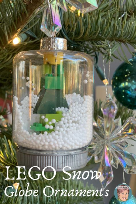 The steps to this snow globe ornament project are pretty simple --the kids bring all the magic. Art with Jenny K. explains how she and her students did this snow globe LEGO ornament project! Ornament Ideas For Kids, Kids Make Christmas Ornaments, Lego Christmas Ornaments, Lego Ornaments, Christmas Ornament Ideas, Diy Xmas Ornaments, Art With Jenny K, Advent Crafts, Diy Snow