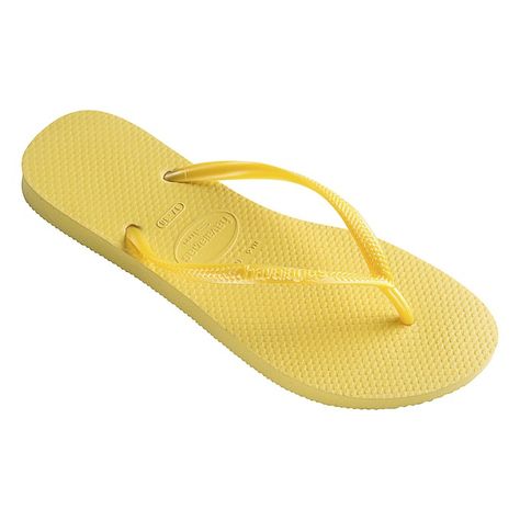 Flip flops for women - Collection | Official Havaianas® shop Yellow Flip Flops, Flip Flops For Women, Yellow Sandals, Rubber Flip Flops, Havaianas Flip Flops, Strappy Shoes, Rubber Sandals, Beach Flip Flops, Metallic Sandals