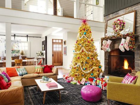 A staid holiday house this is not! Think tie-dye instead of plaid and fuchsia rather than red. HGTV Magazine takes you inside. 1800s Home, Holiday Mantel, Lampoon's Christmas Vacation, Christmas Mantel Decorations, Faux Tree, Boho Christmas, Beautiful Christmas Trees, Mantel Decorations, Christmas Mantels