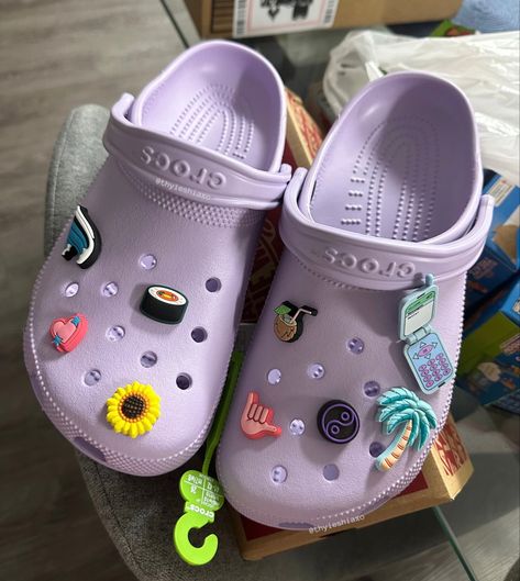 Crocs, crocs shoes, croc charms, summer crocs, purple, purple crocs, lavender, lavender crocs, charms, jibbitz, girly things, shoes, slides Jibbitz Crocs Ideas, Aesthetic Crocs, Crocs Cute, Cool Crocs, Crocs With Jibbitz, Crocs Aesthetic, Crocs With Charms, Crocs Ideas, Crocs Charms