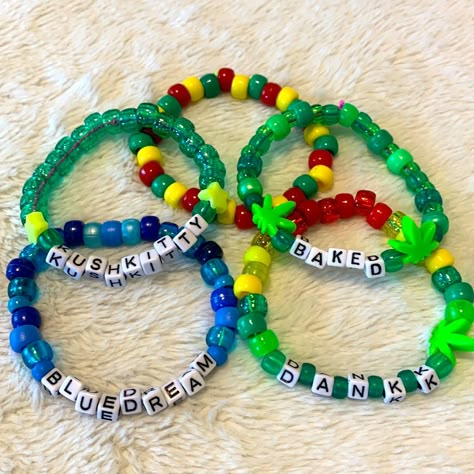 Handmade Word Kandi -This Listing Is For The 5 Bracelets Pictured Above. Cute Rasta Colors With Handmade Leaf Charms One Size Fits Most Stretchy Cord Unique And Fun For Your Next Rave Or Festival! Bundling Is Going To Get You The Best Deal So Check Out My Closet For More Kandi Goodies! Edm Edc Raver Pot Stoner Weed 420 Party Kandi Bracelets Jewelry Beads Plur Glitter Outfit Accessories Rainbow Y2k 90s Neon Trippy Dinosaur Kandi Bracelet, Pot Leaf Bracelet, Rave Beads Bracelets, Candy Bracelet Ideas Rave, Candy Bracelets Rave, Festival Kandi Ideas, Edc Kandi Bracelets, Candy Bracelet Ideas, Rave Kandi Bracelets Ideas