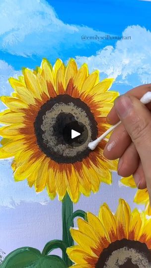 How to paint a Field of Sunflowers 🌻 | Here is a beginner field of sunflowers painting!🎨🌻 In this tutorial I will show you a few new tips and tricks for painting different types of sunflowers.... | By Emily Seilhamer Art | Let me show you how to paint a field of sunflowers today. I'm excited to show you a couple different beginner techniques. But first you need to design your sky. I'm using my mop brush and 11 by 14 canvas board. And I started with a light purple just doing back and forth strokes because purple and yellow complement each other. Then using a sky blue and white. I'm blending that into the light purple. And at the very top I'm going to take a darker bright blue and blend that down into the sky blue because I want it to be slightly darker at the top to frame our eye downwar Painting Sunflowers Easy Step By Step, Sunflower Drawings, Types Of Sunflowers, A Field Of Sunflowers, Sunflowers Painting, Field Of Sunflowers, Sunflower Crafts, Sunflower Drawing, Painting Pictures