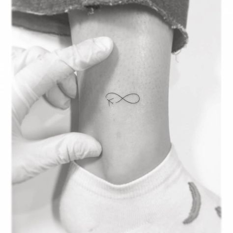 Minimalist infinity symbol tattoo on the ankle. Infinity Symbol Tattoo, Tattoo Tiny, Tattoo Minimalist, Diy Travel Journal, Disney Tattoo, Symbol Tattoos, Disney Tattoos, With Meaning, Trendy Tattoos