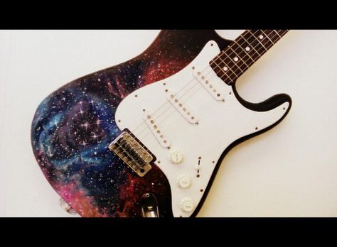 and this Galaxy Guitar, Space Guitar, Guitar Designs, Guitar Painting, Cool Electric Guitars, Galaxy Painting, British Boys, Custom Guitar, Guitar Design