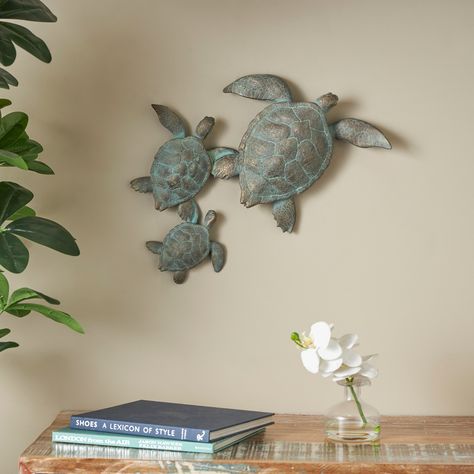 This turtle wall decor can be displayed on a shelf or table to add a touch of maritime charm to your decor. This item ships in 1 carton. Polystone wall decor makes a great gift for any occasion. Turtle Bedroom, Turtle Room, Ocean Themed Bathroom, Turtle Homes, Turtle Wall Decor, Decorative Wall Sculpture, Turtle Sculpture, Turtle Decor, Blue Wall Decor