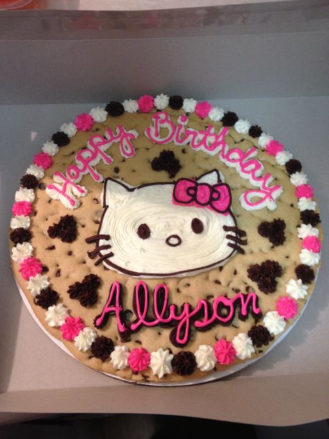 Hello Kitty on a sugar free 14" cookie cake Hello Kitty Cake Easy, Hello Kitty Chocolate Cake, Hello Kitty Birthday Cookies, Hello Kitty Cookie Cake, Hello Kitty Birthday Theme, Kitty Birthday Cake, Hello Kitty Cookies, Hello Kitty Birthday Cake, 7th Birthday Cakes