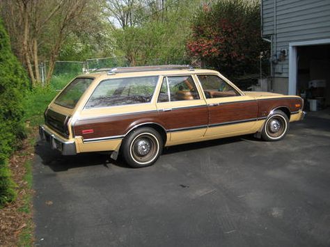 1978 Plymouth Volare Station Wagon ... Don't recall if ours was a 1978, and we certainly didn't have the wood paneling. Ours was a banana yellow, plastic interior ... My high school cruising car. Lots of stories regarding that car that I won't go into. 70s Station Wagon, 80s Station Wagon, Wood Panel Station Wagon, 1980s Station Wagon, Old Station Wagons, Plymouth Volare, 80s Cars, Old Benches, Station Wagon Cars