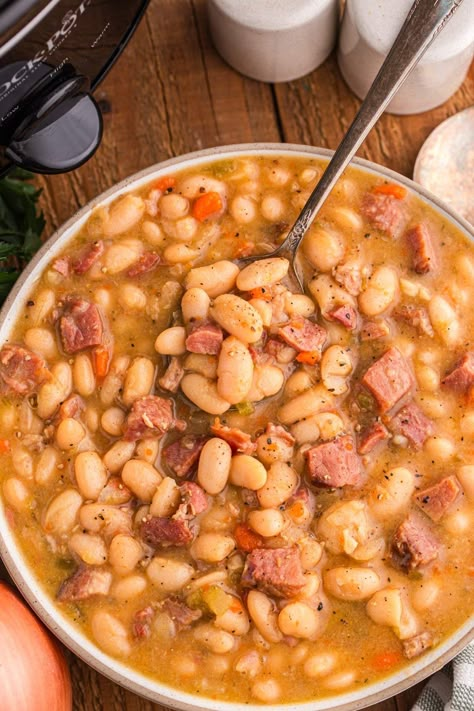 Slow Cooker Ham and Bean Soup - xoxoBella Ham Soup Crockpot, Crockpot Ham And Bean Soup, White Bean Ham Soup, White Bean And Ham Soup, Ham And White Bean Soup, Ham And Potato Recipes, White Bean And Ham, Bean Soup Crockpot, Crockpot Ham And Beans