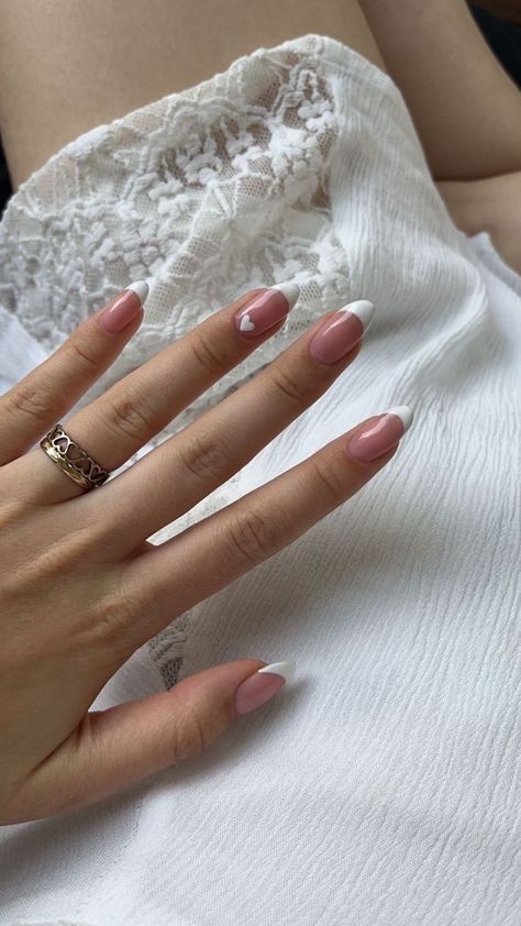 #dailye🧿 | dailymea | VSCO White French Tip With Pink Heart, Pink Nail White French Tip, French Nails With Design On Ring Finger, French Tips With Design On Ring Finger, French Tip Nails With Heart Design, Nude Shellac Nails, Ireland Nails, French Tip With Hearts, French Tips With Heart