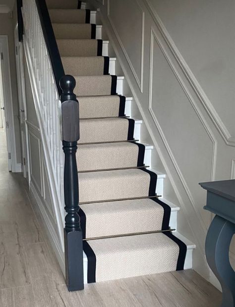 Stair runners are often MUCH cheaper then a full carpet on the staircase and when paired with cast iron rods, add a beautiful Victorian London look! An essential cheap upgrade for upstairs flats! Hallway With Stair Runner, Pine Staircase Makeover, Stair Runner Black Trim, Stair Runner Bars, Hallway Bannister Ideas, Staircase Makeover With Runner, Black Stairs Runner, Classic Stair Runner, Black And White Staircase With Runner