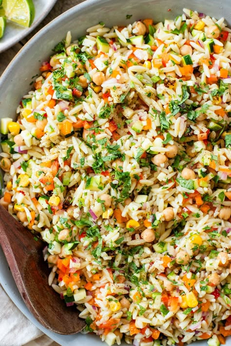 This Summer Veggie Orzo Salad is packed with chilled orzo, chickpeas, crisp veggies, and a light chipotle dressing. Perfect for a party! Roasted Veg Orzo Salad, Vegan Orzo Salad Recipes, Veggie Orzo Salad, Vegetable Orzo Salad, Grilled Veggie Orzo Salad, Wfpb Salad, Cold Summer Salads Orzo, Veggie Orzo, Chipotle Dressing