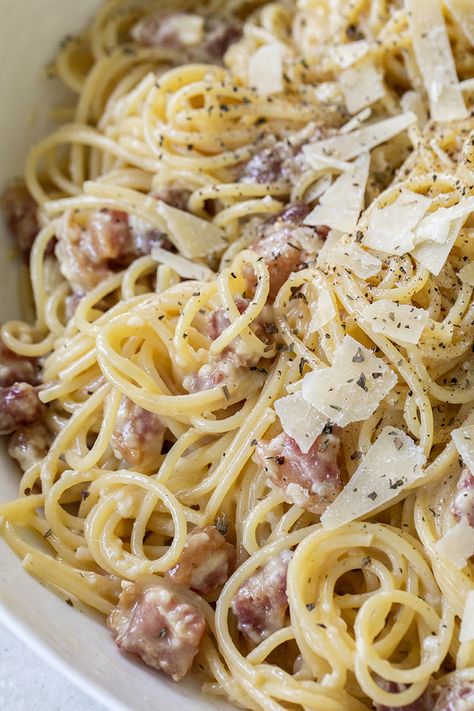 Our family goes crazy for this flavorful carbonara! Easy carbonara made with pancetta, eggs, cream, parmesan and thick spaghetti or bucatini noodles. The perfect Italian comfort food! #Italian #Carbonara #Pasta #Egg #Cream #Dinner #Easy #Recipe #Pancetta #Bacon Carbonara With Cream, Meatball Carbonara, Carbonara Pasta Recipes, Cabonara Recipes, Carbonara Sauce Recipe, Carbonara Recipe Creamy, Best Dinner Party Recipes, Easy Carbonara, Carbonara Recipes