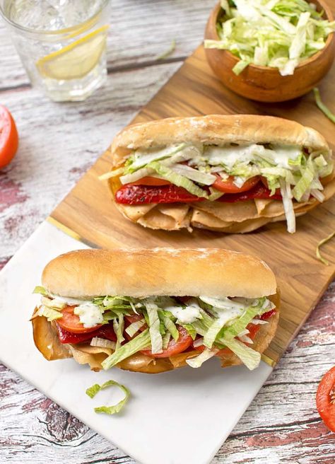 Vegan Hero Sandwiches with Fresh Herb Mayonnaise - The Vegan Atlas Vegan Hoagie, Ploughmans Sandwich, Protein Sandwich, Hero Sandwich, Vegan Potato Salads, Sub Sandwiches, Vegan Mayonnaise, Vegan Potato, Sliced Turkey