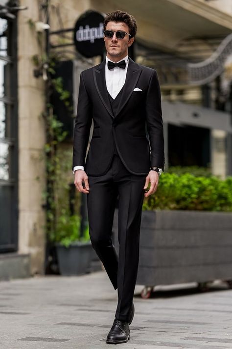 Redefine elegance with the Black Slim-Fit Tuxedo 3-Piece. Its refined silhouette and rich black hue set the stage for an unforgettable presence at any formal affair. From upscale weddings to prestigious galas, this ensemble promises to elevate your style quotient, making you the epitome of sophistication and charm.

#singlebreasted #blacktuxedo #tuxedo #suit #suits #slimfit #menstyle #menfashion #fashioninspo Bow Tie Suit, Modern Fit Suit, Suit Styles, Suit Stores, Slim Fit Suit Men, Slim Fit Tuxedo, Tuxedo Blazer, Slim Fit Suits, Tuxedo Suit