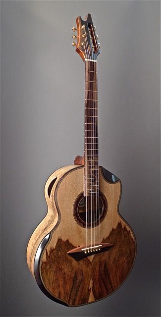 The Mango Tree (acoustic guitar) : :  Jeffrey Yong, luthier : : body made of old growth mango tree wood. Custom Acoustic Guitars, Guitar Ideas, Guitar Pins, Guitar Photography, Guitar Pics, Archtop Guitar, Unique Guitars, Classic Guitar, Beautiful Guitars