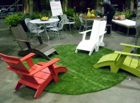 Backyard Sitting Area, Colorful Adirondack Chairs, Backyard Lighting Diy, Backyard Sitting Areas, Round Outdoor Rug, Patio Design Ideas, Grass Rug, Patio Steps, Outdoor Sitting Area