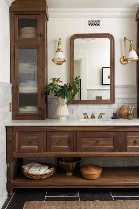 Added Storage In Bathroom, Master Bath Shelves, Coastal Moody Bathroom, Stained Wood Cabinets Bathroom, Hacienda Style Homes Bathroom, Dark Wood Floating Vanity, Paneling Behind Bathroom Vanity, Built In Bookshelves Vintage, Slate Bathroom Floor Wood Vanity