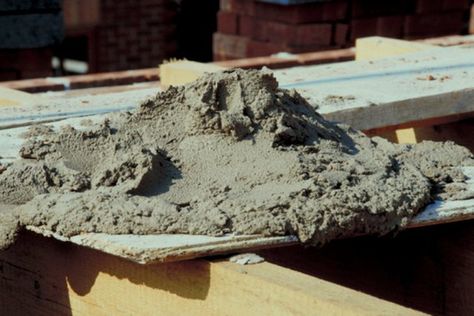 Portland cement is made up of a number of compounds, but primarily consists of limestone and clay. It can be mixed with water, sand and other materials for use in building and... Concrete Table Top, Artificial Rocks, Fake Rock, Faux Rock, Concrete Statues, Stamped Concrete Patio, Concrete Diy Projects, Portland Cement, Concrete Pavers